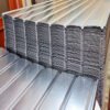Stack of zinc steel coils in warehouse Metal Roofing System Manufacturer _ PPGI, GI, GL Roofing Sheets & Sandwich Panels
